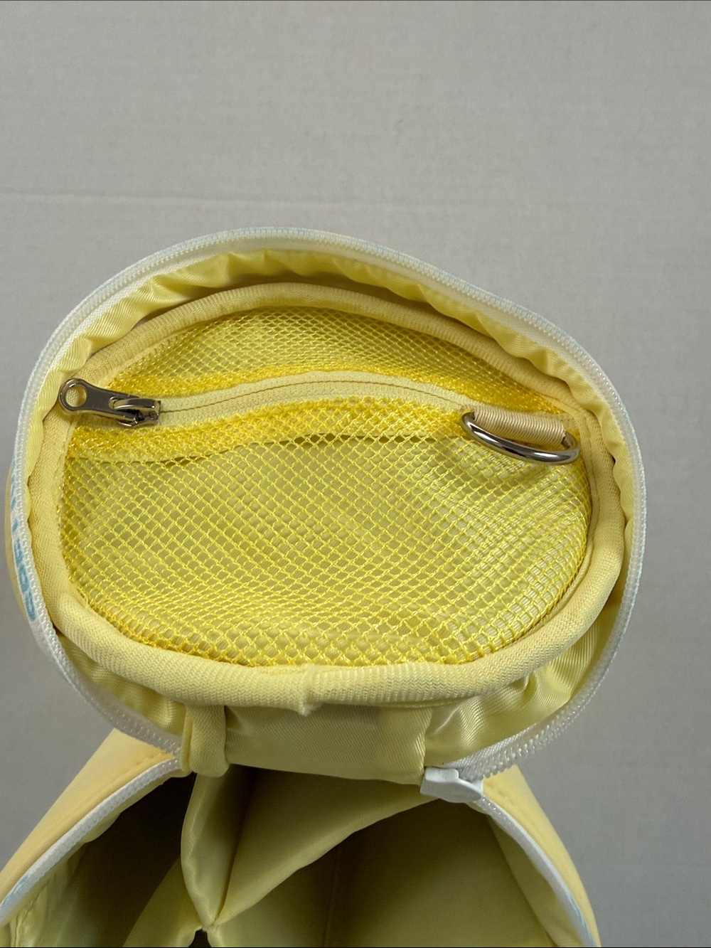 Supergoop! Pale Yellow Neoprene Sunscreen Pouch with Blue Accent - Picture 4 of 5